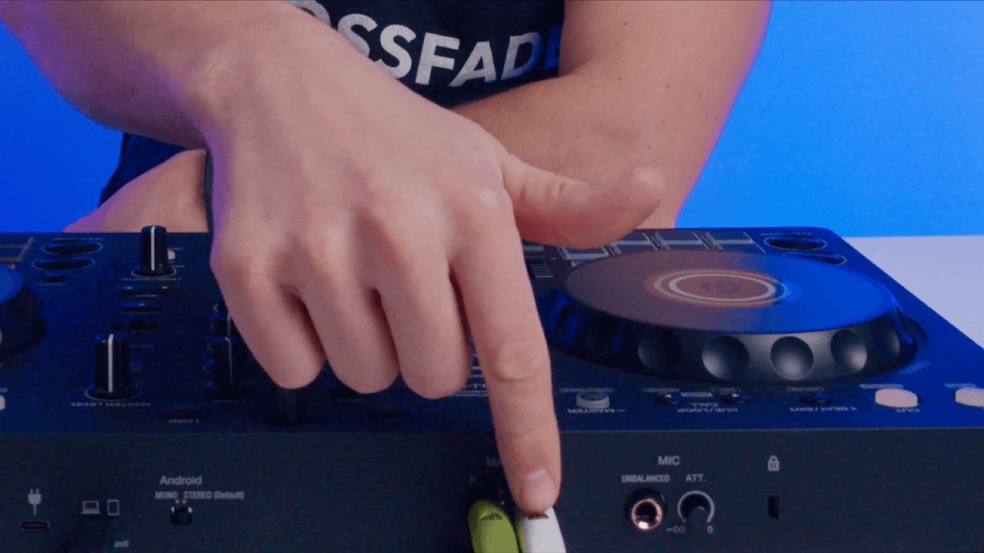 Hands getting set up on the DDJ-FLX4 controller