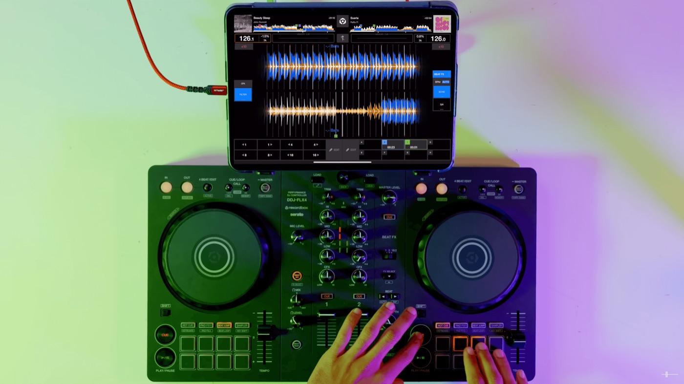 Top-down view of performing on the DDJ-FLX4 with rekordbox on an iPad
